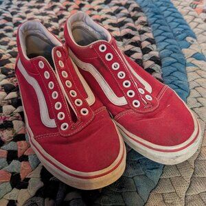 Red and white Vans trainers
